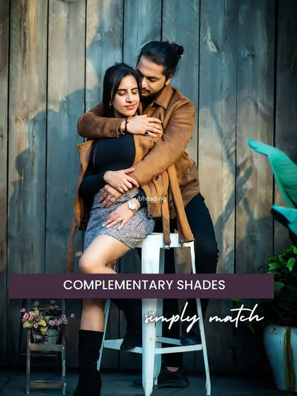 Coordinating your outfits in complementary shades is a great way to look cohesive without being overly matched. This couple's earth-toned jackets create a warm, harmonious look that is stylish and intimate.