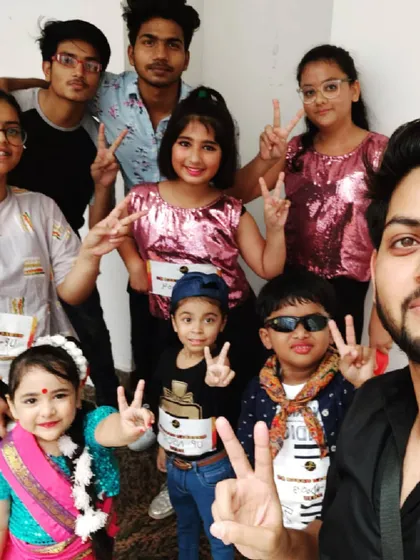A quick backstage selfie with my students before they go on to perform. The excitement and team spirit in these moments are what make event choreography so special.