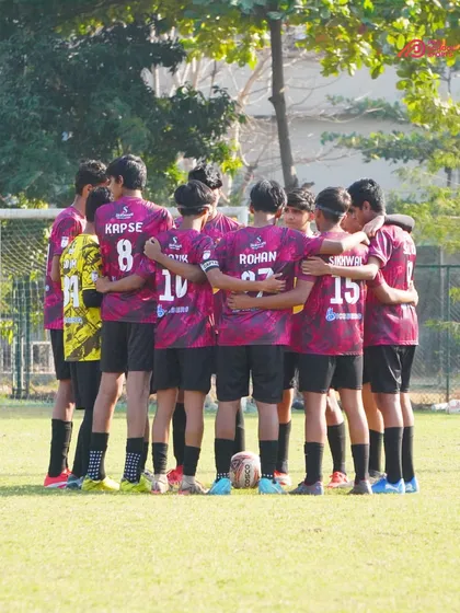 United we stand. A team huddle is more than a pre-game ritual; it's a promise to play for each other. This is where individual players become a single, focused unit.