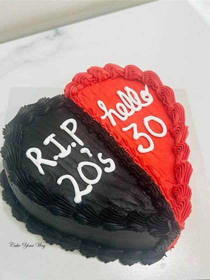 Out with the 20s, in with the 30s. A fun, split-heart cake to say goodbye to one decade and hello to the next.