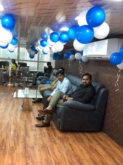 The lounge and seating area were also part of the inauguration decor. Blue and white balloons on the ceiling and walls maintained the festive atmosphere throughout the office.