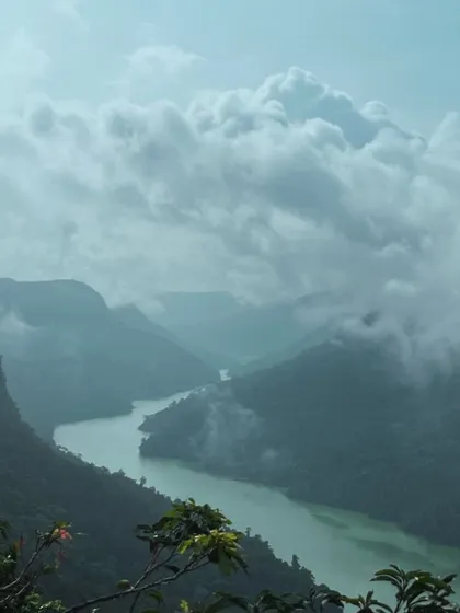 A misty, atmospheric shot of the Sharavathi River valley.