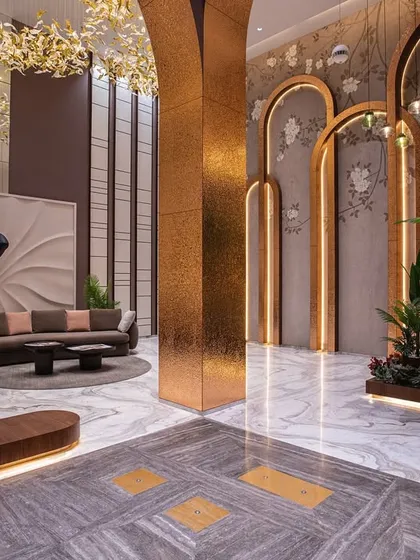 We believe the first impression is a lasting one. This lobby in Surat was designed to evoke a sense of grand arrival, where opulent materials and sculptural forms converge to set a tone of understated luxury. The interplay of metallic arches, ambient lighting, and curated art establishes a powerful identity for the space.