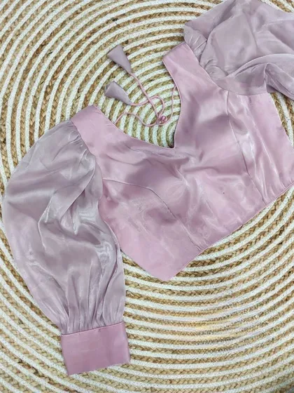 The organza balloon sleeve blouse in a lovely lavender shade.