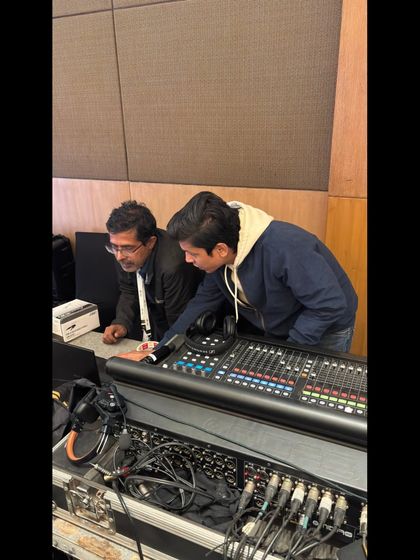 Our team at the audio mixing console for the Google AI Impact Summit. We ensure crystal-clear sound for all speakers, panelists, and video playbacks throughout the event.