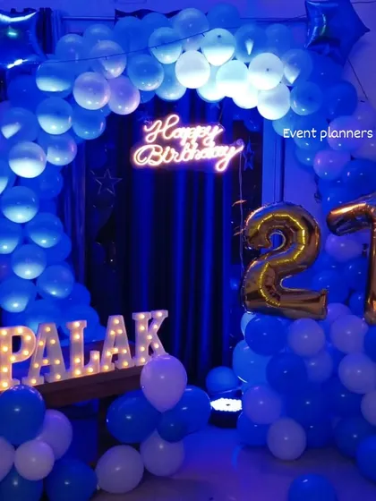 The 21st birthday setup under deep blue lighting for a cool party vibe.