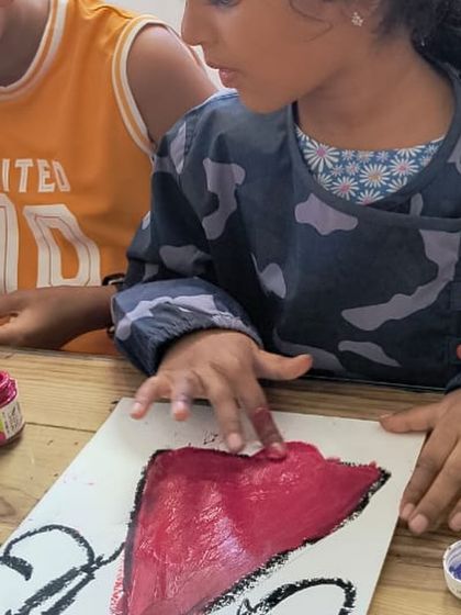 Getting hands-on with finger painting. We believe in letting kids get a little messy to truly connect with their materials and express themselves freely.