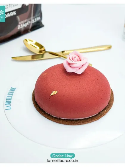Our individual chocolate mousse dome, presented with the high-quality ingredients we use to create its rich flavour.
