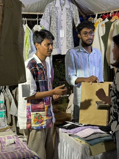 A sale in progress at a men's apparel stall. It's rewarding to see homegrown brands connect with customers and make sales.