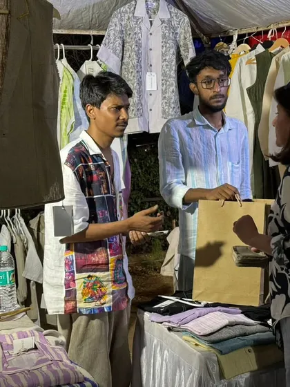 A sale in progress at a men's apparel stall. It's rewarding to see homegrown brands connect with customers and make sales.