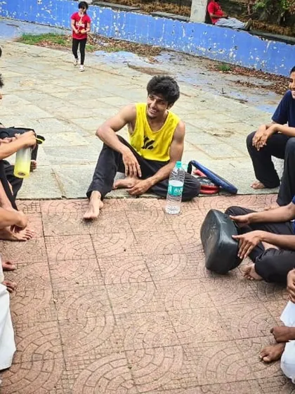 Sharing a laugh with my students. We train hard, but we also know how to relax and bond as a team.