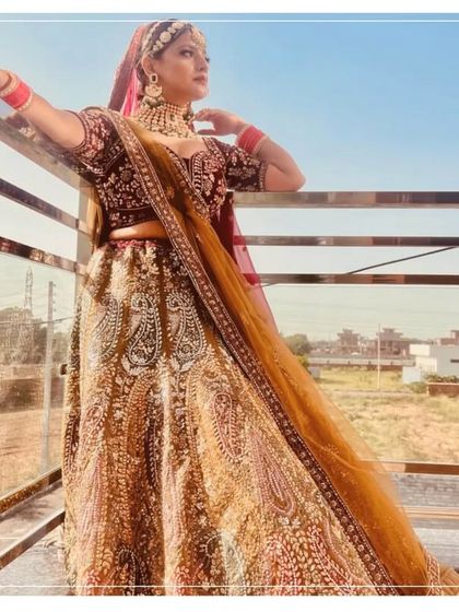 This bridal lehenga looks absolutely stunning in the sunlight. The perfect outfit for a day wedding photoshoot.