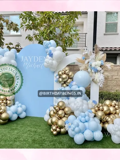 A wider view of the chic outdoor party decor, perfect for a stylish first birthday or baby shower.