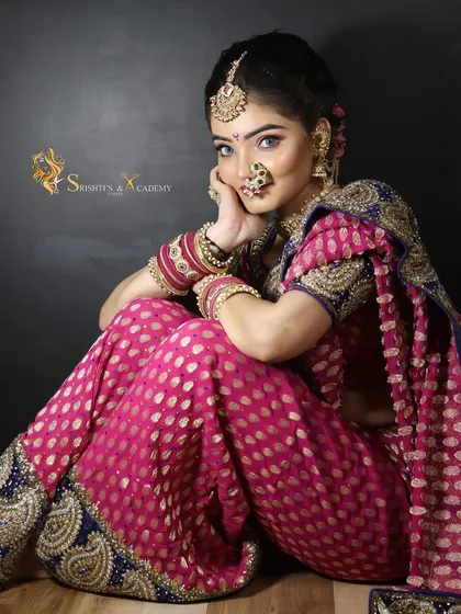 A close-up of our traditional Maharashtrian bridal look, showcasing the detailed eye makeup, traditional nath, and bindi.