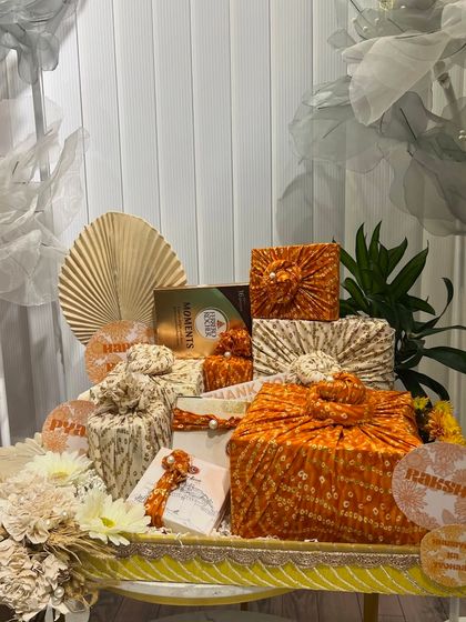 Another angle of the bandhani-wrapped Rakhi platter. The combination of different prints and the elegant tray makes for a stunning display.