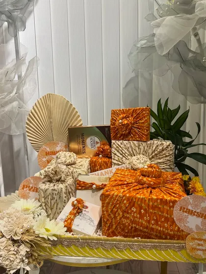 Another angle of the bandhani-wrapped Rakhi platter. The combination of different prints and the elegant tray makes for a stunning display.