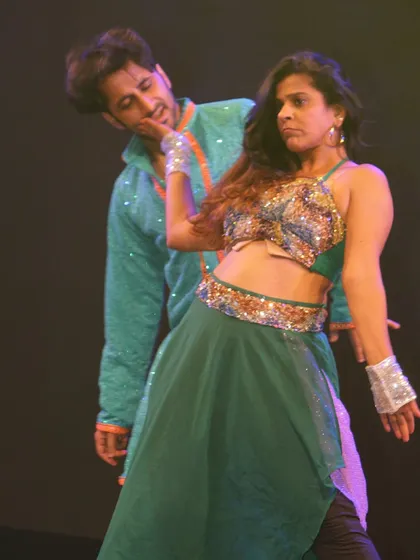 A playful moment captured on stage during our 'Manch 23' performance. The stage is where we come alive, and this photo shows the fun and chemistry between the performers.