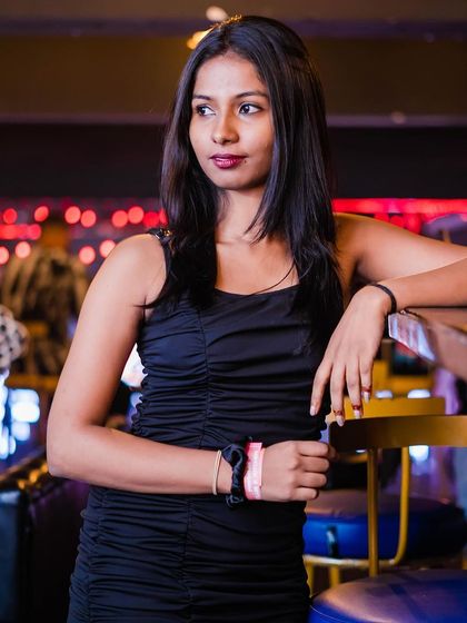 A guest posing at the bar.