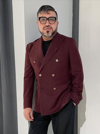 A straight-on shot of my burgundy double-breasted jacket look, showing its sharp tailoring and confident silhouette.