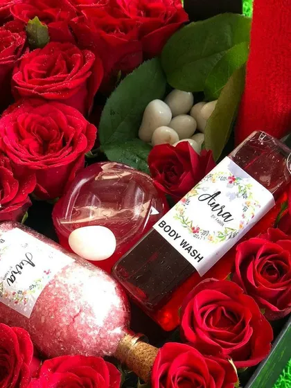 For a truly romantic gift, I collaborated with a florist to create this stunning heart-shaped box. It's filled with fresh red roses and my own rose-fragranced bath salt and body wash for a complete sensory experience.