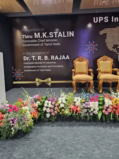 For the UPS India inauguration, I designed a professional stage setup featuring a custom branded backdrop and elegant floral runners. This creates a polished focal point for high profile ceremonies and presentations.