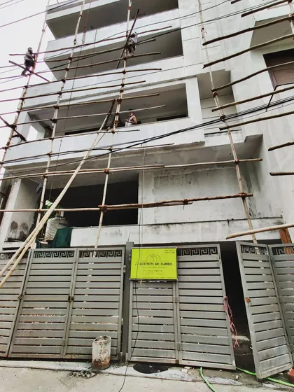 The "before" shot of our own office building in Malviya Nagar, prior to renovation. It was a standard residential structure that we decided to completely redesign and execute.