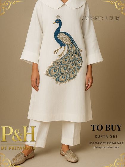 A full-length shot of the white linen kurta set, showing the graceful movement of the fabric and the comfortable yet stylish fit of the matching trousers.