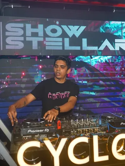 Focused on the mix at Cyclone, with the blue-lit "Show Stellar" branding setting the mood.