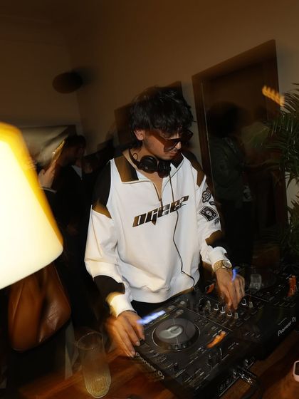 Behind the decks at the Qurated coffee shop in Jaipur. It shows my adaptability, playing a set in a non-traditional venue.