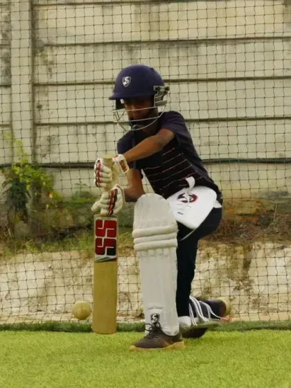 Every champion starts somewhere. Here, one of our youngest players shows intense focus during net practice, proving that it's never too early to learn the fundamentals of cricket.