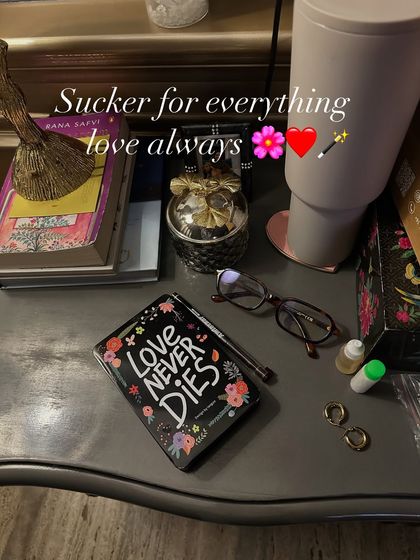 This is my reminder that it's okay to lean into small comforts when you're feeling overwhelmed. Sometimes sitting with your emotions means surrounding yourself with things you love, like a good book.