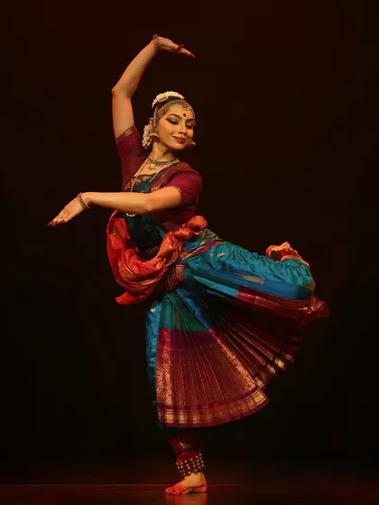 Dance is my first language. This is a moment of complete immersion during a Bharatanatyam performance, capturing the dynamic energy and expressive storytelling that is at the core of my training and my identity as an artist.