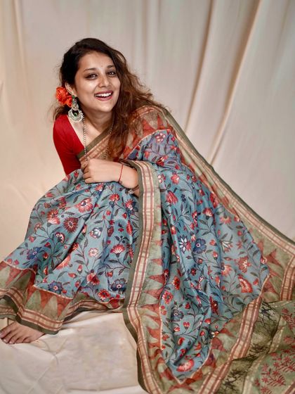 A happy and carefree moment, showing my love for sarees and how they can be styled for a comfortable, relaxed feel.