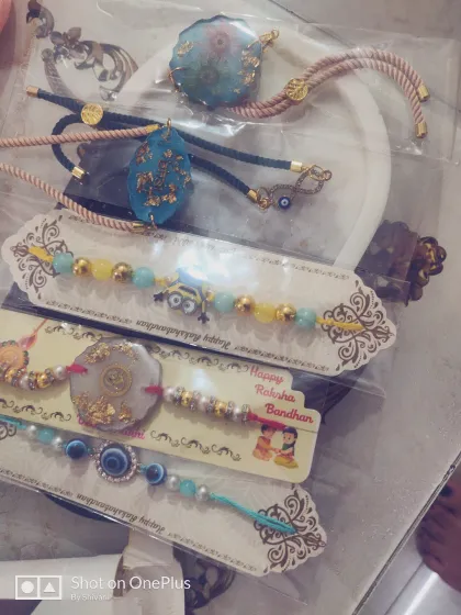 This Raksha Bandhan, celebrate your bond with a rakhi that lasts forever. Here is a selection of my handmade resin rakhis, from elegant designs with gold flakes and dried flowers to fun ones for younger brothers. Each one is a unique piece of art.