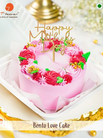 A vibrant and beautiful Bento Love Cake in shades of pink and red, topped with a "Happy Mother's Day" pick to make her smile.