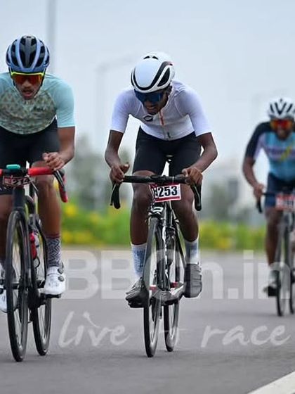 A breakaway of three riders works hard to maintain their gap from the main field.