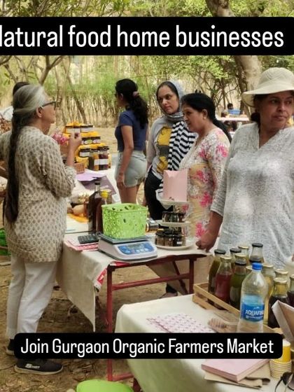 A photo of women entrepreneurs at their stall, highlighting the market's support for local businesses.