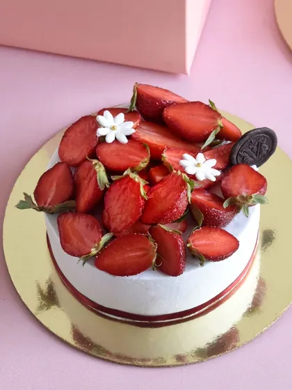 Our Strawberry Shortcake is a seasonal favorite. It's made with a simple vanilla sponge, fresh whipped cream, and is loaded with juicy, fresh strawberries. It's light, refreshing, and simply delicious.
