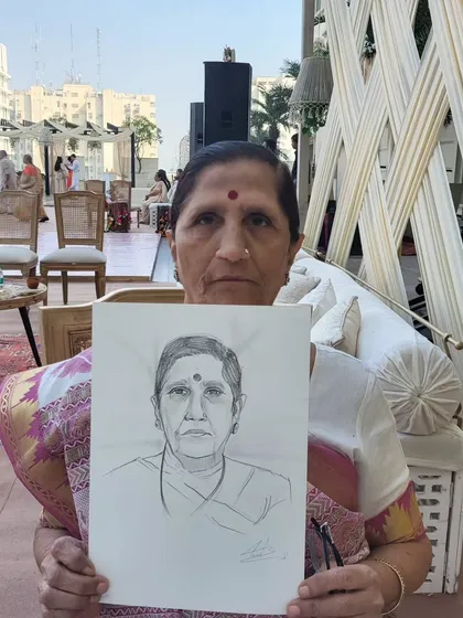 Seeing the smile on a guest's face when they see their finished portrait is the best part of my job. I love capturing the personalities of people from all walks of life, making sure everyone feels seen and gets a special keepsake from your event.