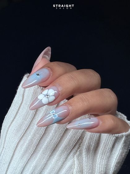 A close-up on the hand-painted bow and 3D flower. The tiny rhinestone center adds a perfect touch of sparkle to this delicate design.