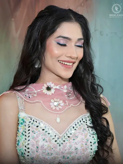 A close-up on the eye makeup, featuring a lovely blend of pastel purple and pink eyeshadow. This look is perfect for someone who loves soft, romantic colors.