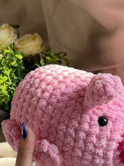 A side view of our chunky yarn pig. It's a charming and unique gift that stands out from mass-produced toys.