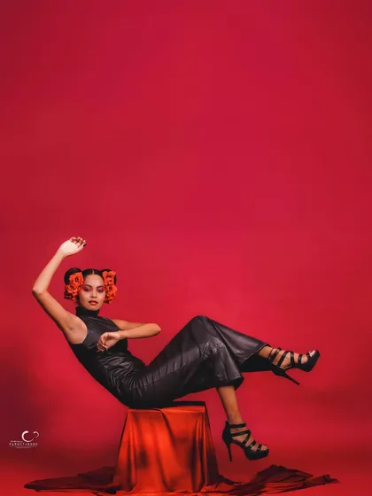 A full-view of the dramatic reclining pose, showcasing the entire artistic concept from head to toe.