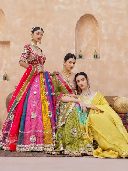 Your bride tribe deserves to look as stunning as you do. We create custom lehengas for the whole squad, playing with vibrant colors and unique designs that complement each other. From bold reds to festive greens and yellows, we'll make sure your entire crew is picture-perfect.