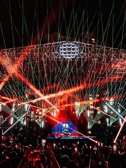 Another angle of the incredible laser production for Boris Brejcha, showing the complexity and scale of the lighting rig.