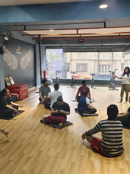 Our instructor leading a mindfulness session. We provide a dedicated space and expert guidance to help you disconnect from stress and reconnect with yourself.