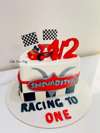 Zooming into six months of joy. A "Racing to One" half-birthday cake.