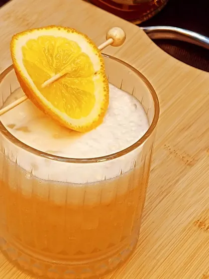 The rich color and texture of a well-made Whisky Sour. This is a popular request at weddings and corporate events alike.