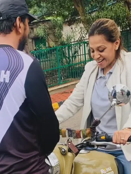 The moment of understanding. A student's smile shows her growing confidence as we discuss a riding technique. These breakthroughs are what our training is all about.