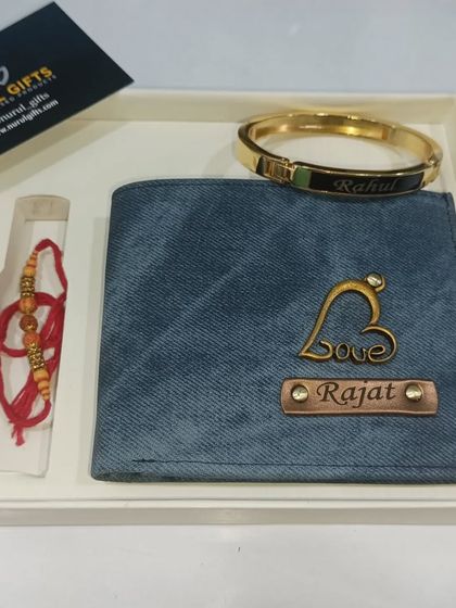 A Rakhi gift set with a personalized wallet, a name kara, and a Rakhi, without the perfume.